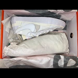 Never worn, new nike low blazers. woman’s 8.5, mens 6